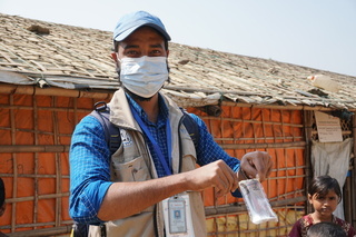 Water sample being collected from Rohingya refugee camps
