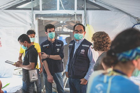 WHO staff with other partners at the logistics base in Cox's Bazar, Bangladesh