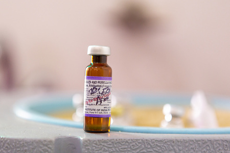 A vial of measles and rubella vaccine. Two shots of this vaccine give almost 100% protection against both measles and rubella. Nepal has successfully controlled rubella, and plans to eliminate both measles and rubella to meet the WHO South-East Asia region's goal of eliminating both by 2023. Bhaktapur, Nepal. August 2019.
